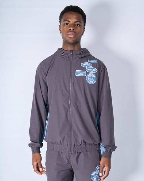 Contrast Badge Windbreaker Slate Flint
